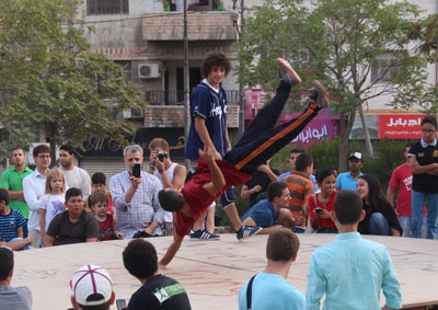 Young people dance hip-hop during a festival in Amman on Friday (Photo by Emily Packer)